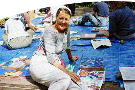 Janet Crane working on her mosaic  paver at the 2004 OWA Retreat